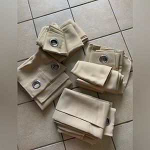 4 panels of tan blackout curtains